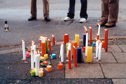candles burning on the ground